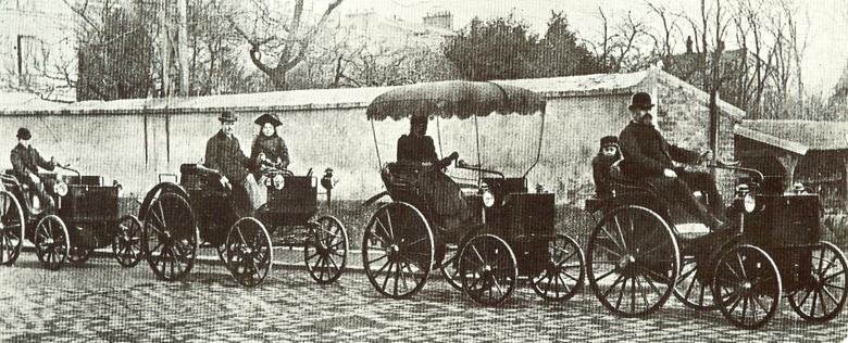 Emile Levassor drives along in hs 1892 V-twin Panhard, followed by his wife and friends